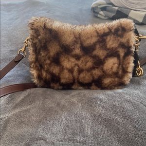 Coach swinger shearling crossbody